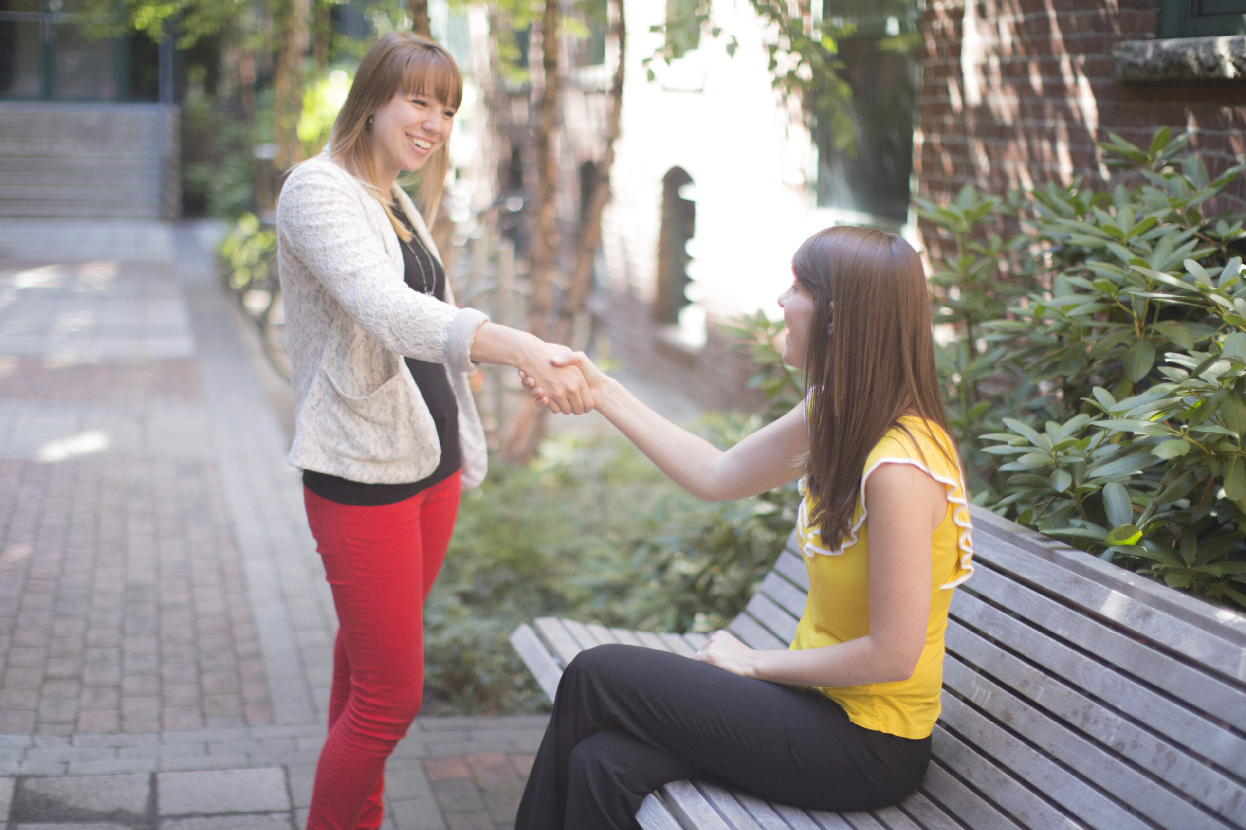 Ladies shaking hands