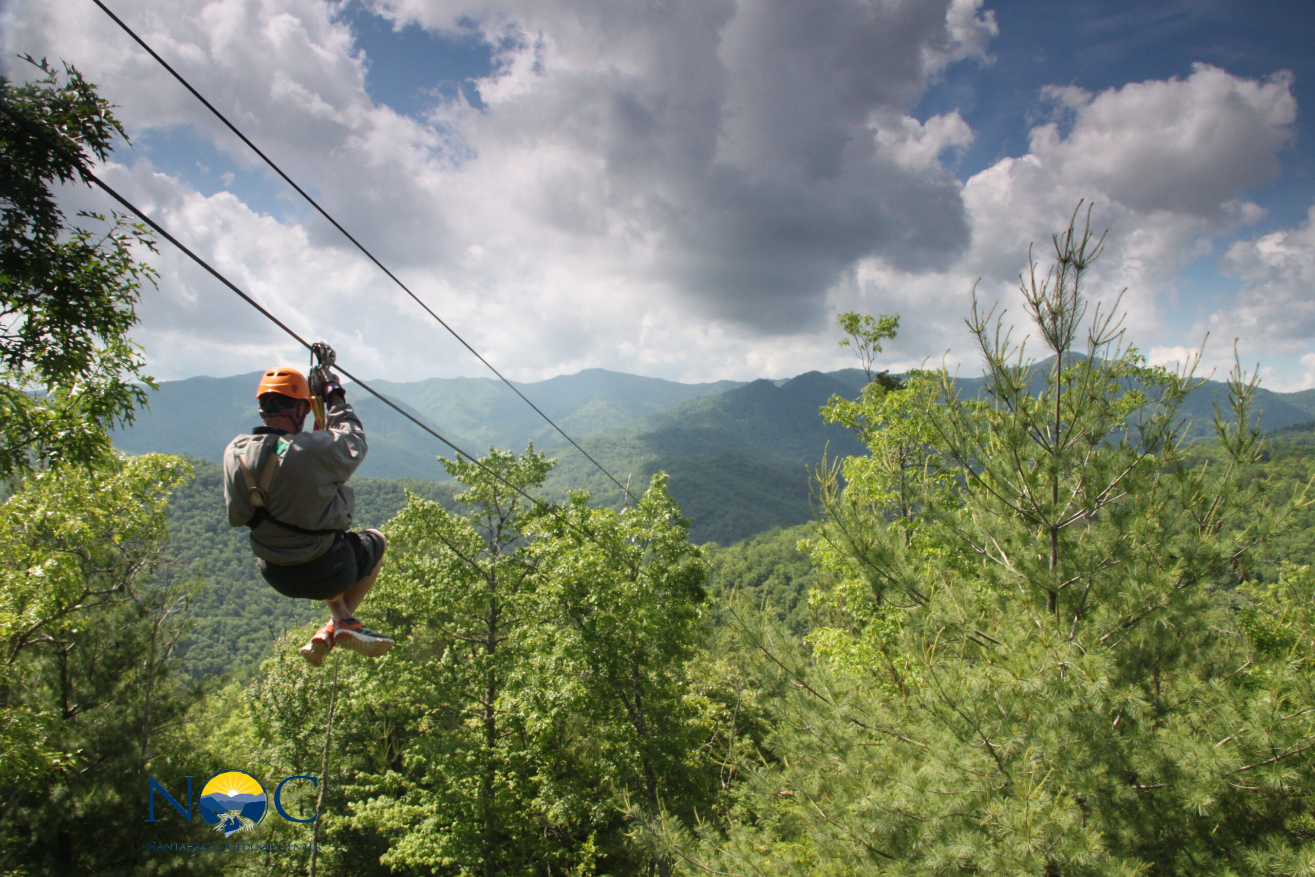 Ziplining over a gorge Ziplining in the Smokey Mountains